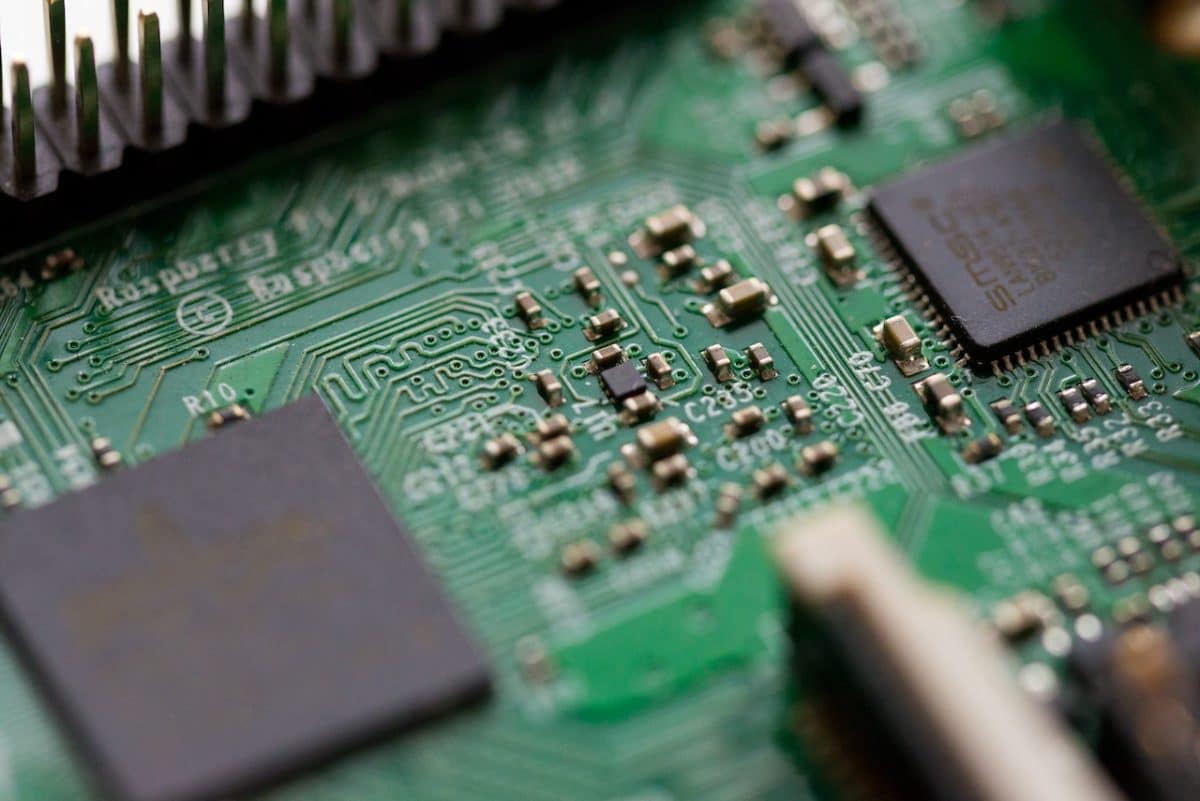 close up of green and black computer chip