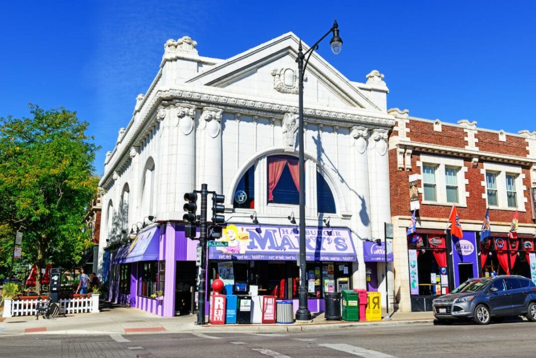 Swedish American State Bank Building on North Clark Street in Andersonville, a neighborhood in the Chicago community of Edgewater on the Far North Side. Landmark building built in 1913. Now a fast food restaurant, Hamburger Marys. City street with background people