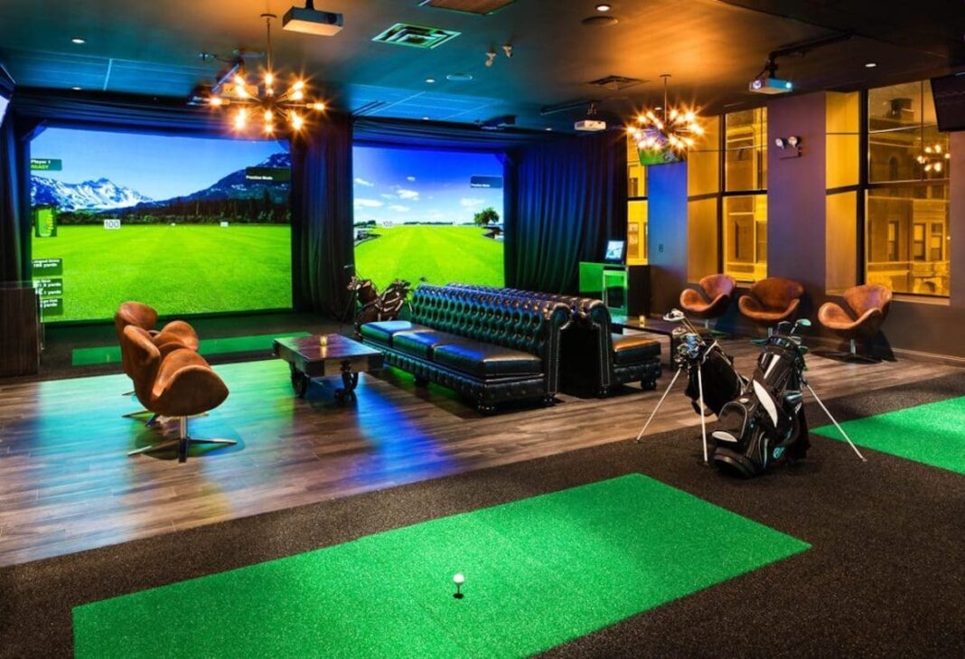 indoor golf bar with chairs and couches